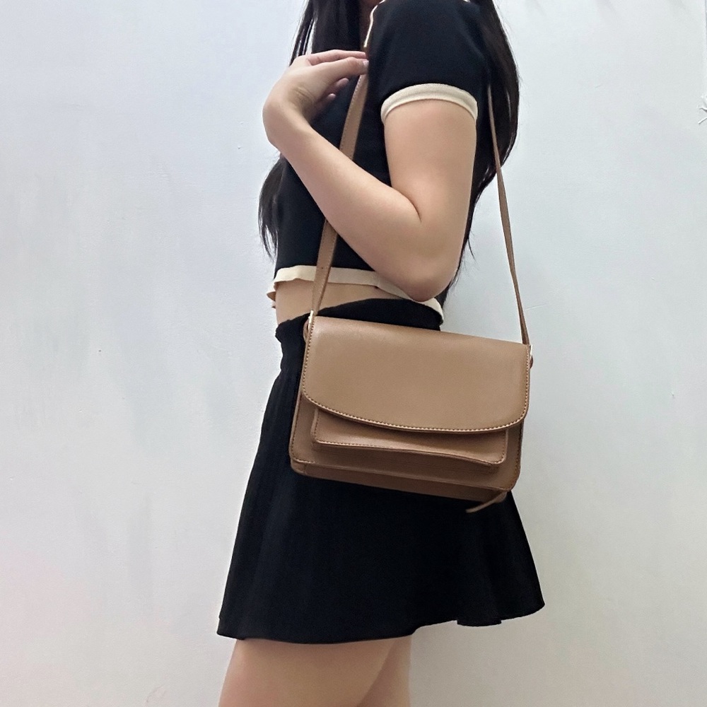 Crossbody tan satchel flap bag